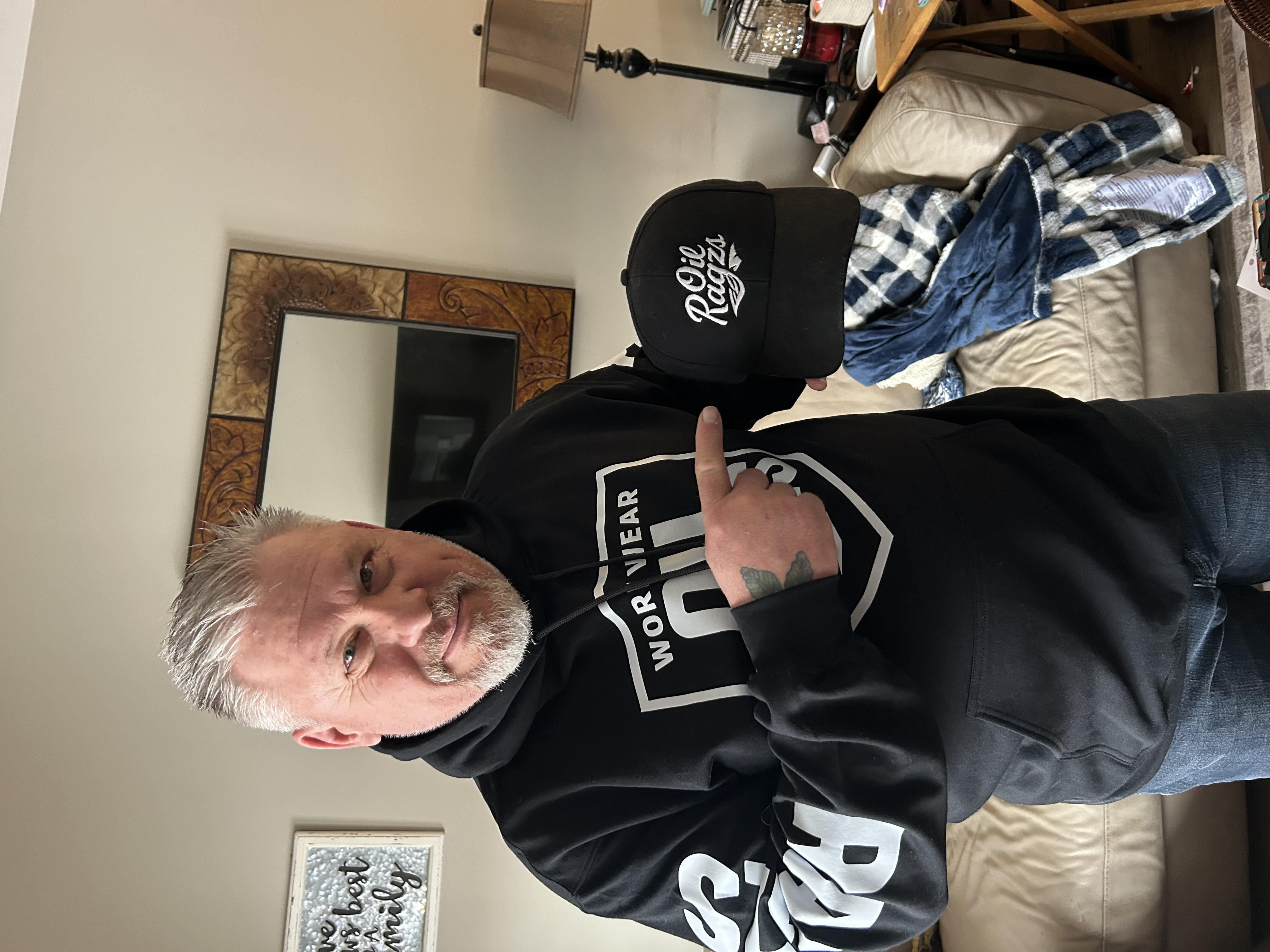 Oil Ragzs founder wearing the Work Wear hoodie and cap